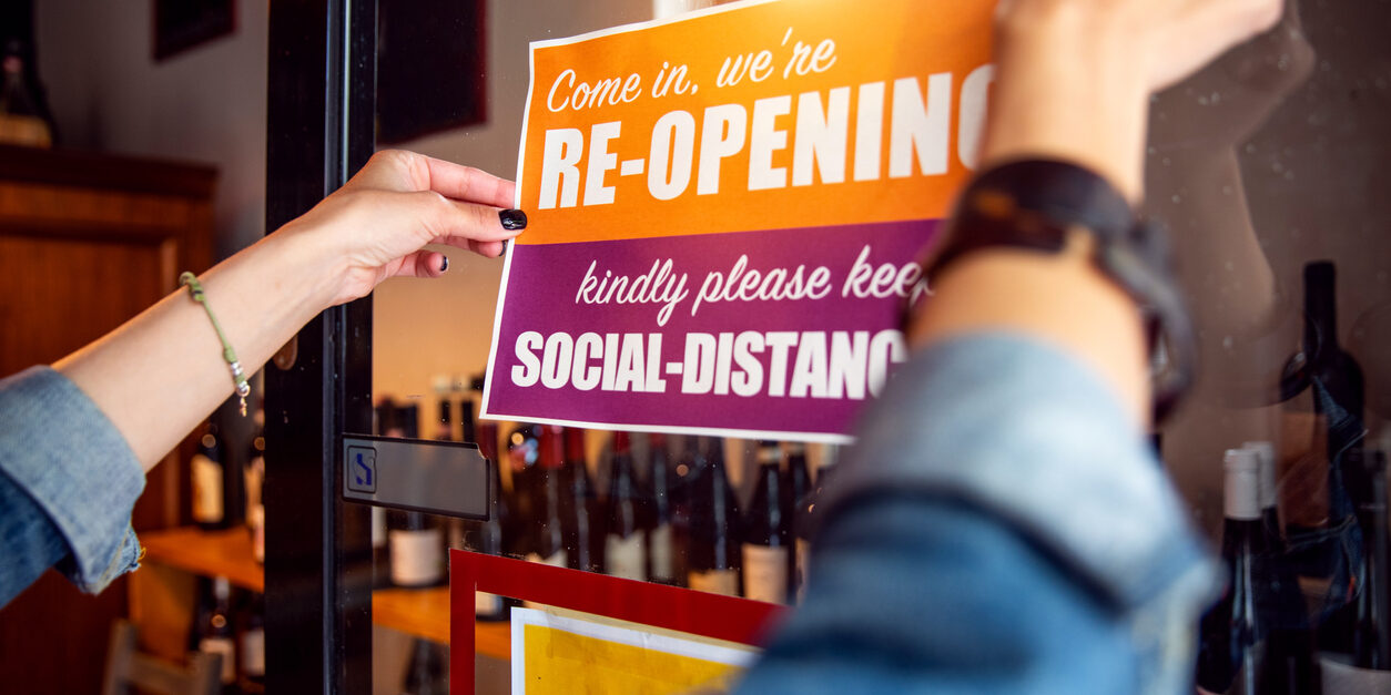 Open sign in a small business shop after Covid-19 pandemic